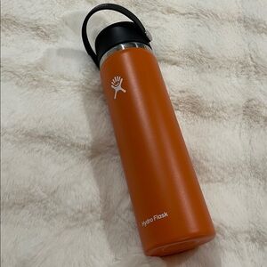 Hydro Flask Orange Bottle with Black Handle